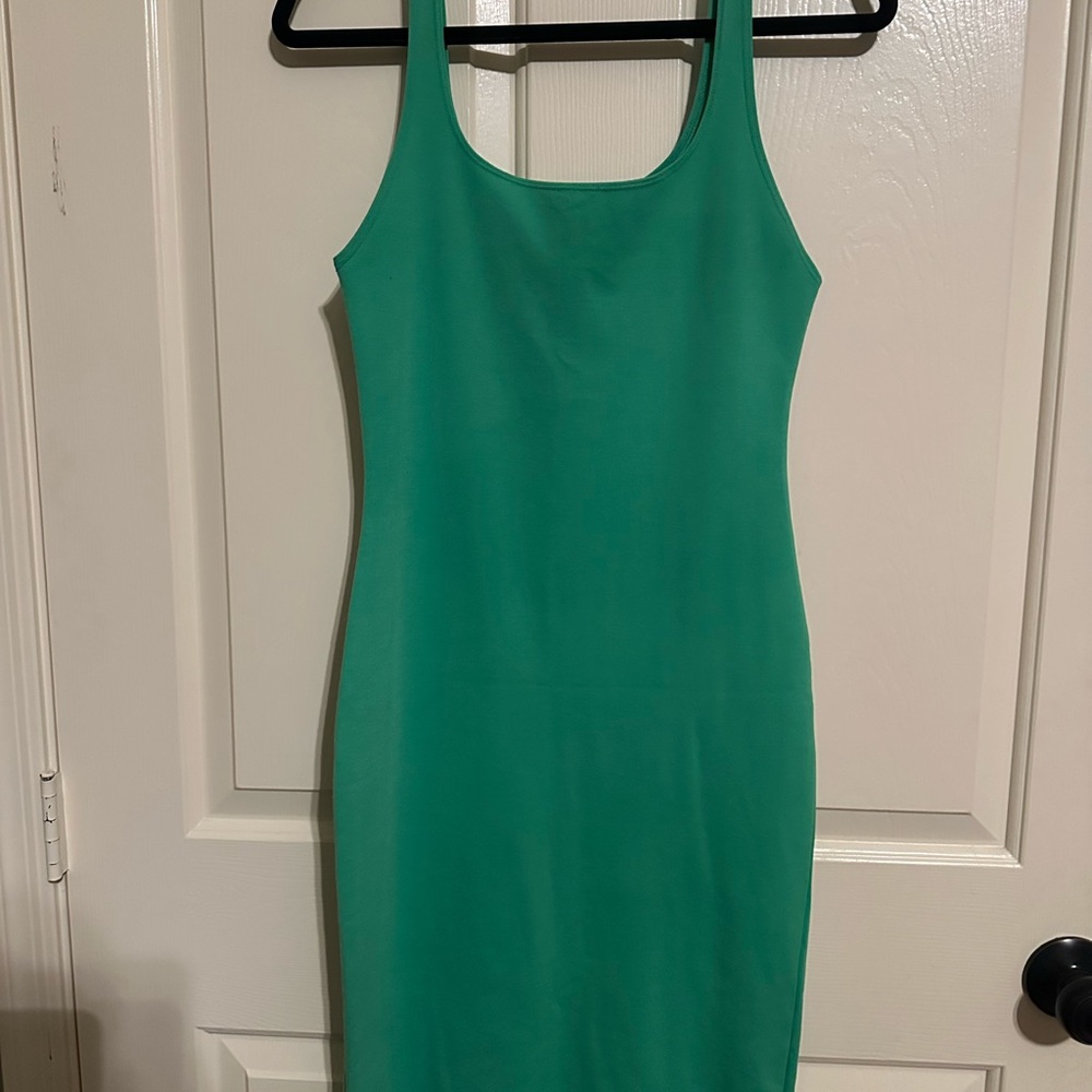 Zara green bodycon midi dress featuring a scoop neckline and thick tank strap
